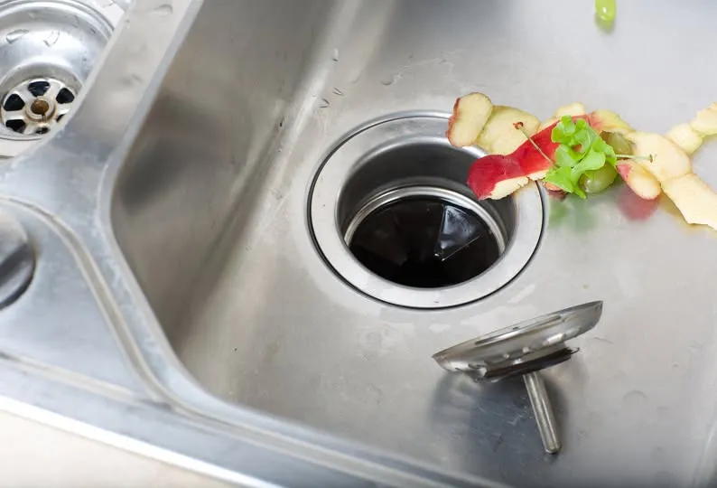 garbage-disposal-Slow-Drainage-or-Clogs